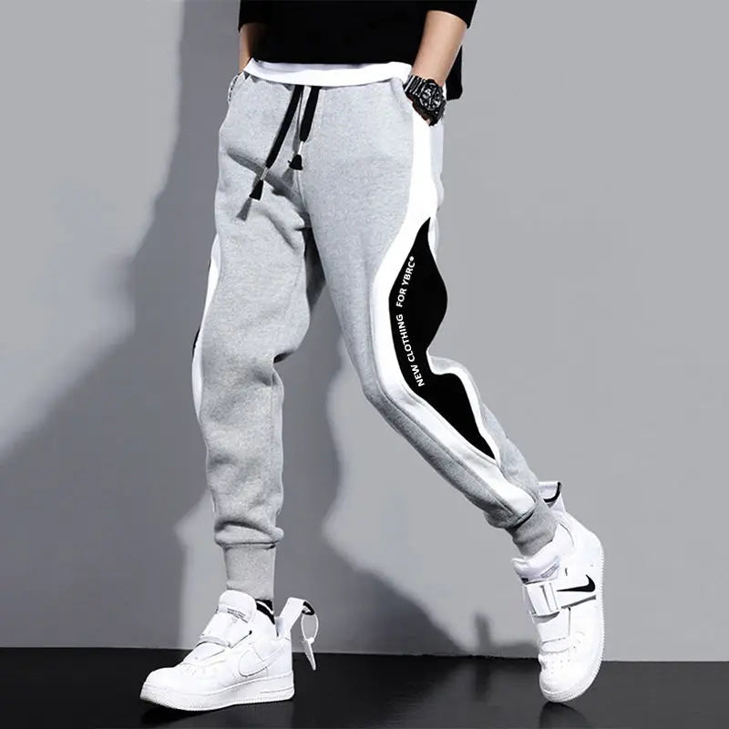 Autumn Men Wide Loose Casual Pants 
Male Elastic Rope Breathable Tie-foot Trousers